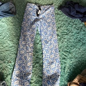 motel rocks high rise flare blue and white love stamp pants